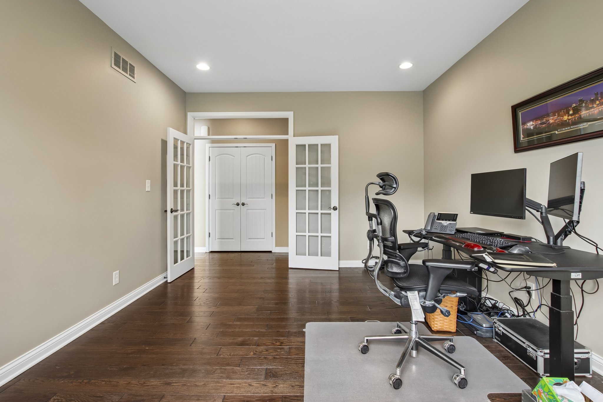 Private Office / Flex space with Transom over the French Doors