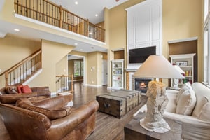 Open staircase overlooks the great room with tons of natural light