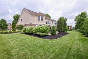 Enjoy your private outdoor oasis with the mature plantings, and walk paths to the lush lawn