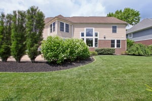 Enjoy your private outdoor oasis with the mature plantings, and walk paths to the lush lawn