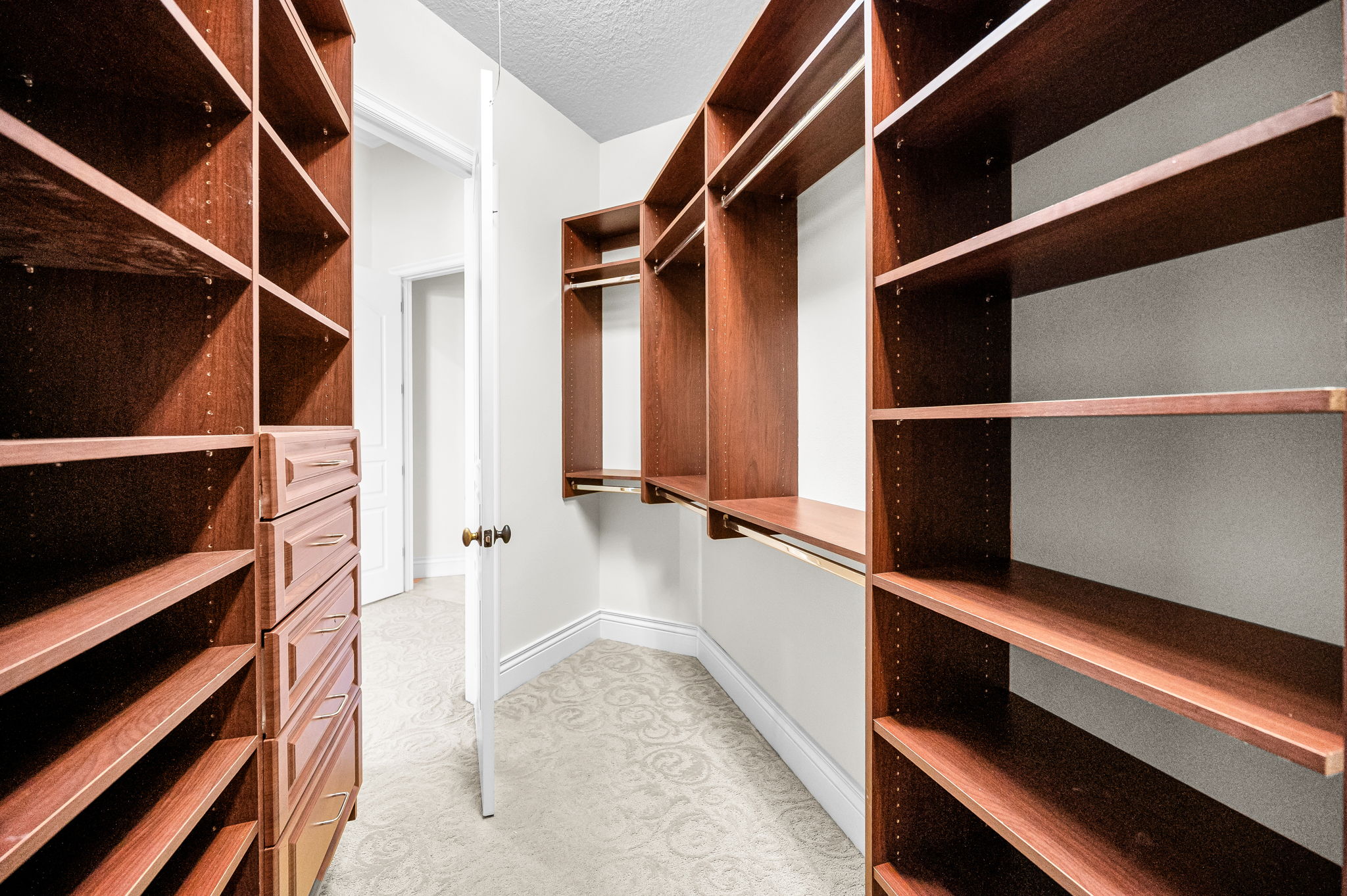 Primary Bedroom Walk-in Closet10b