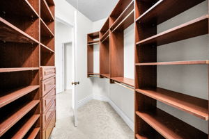 Primary Bedroom Walk-in Closet10b