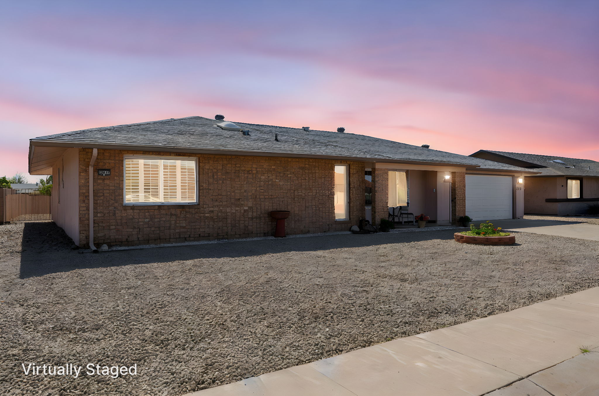 9937 W Mescalero Ct - 002 day to dusk.jpeg