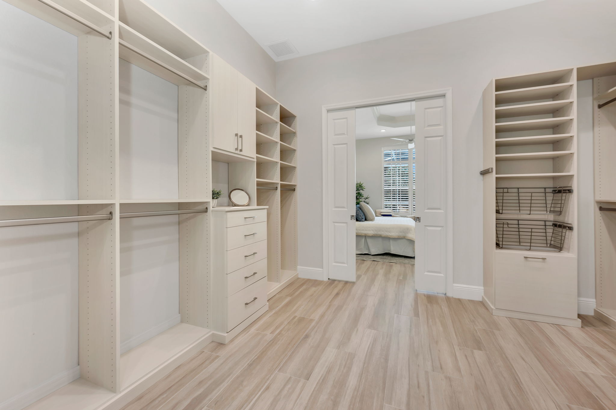 Owner's walk-in closet conveniently located between bedroom and bathroom