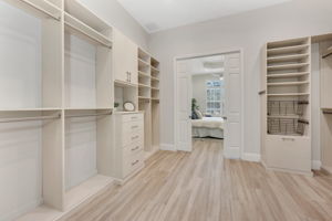 Owner's walk-in closet conveniently located between bedroom and bathroom