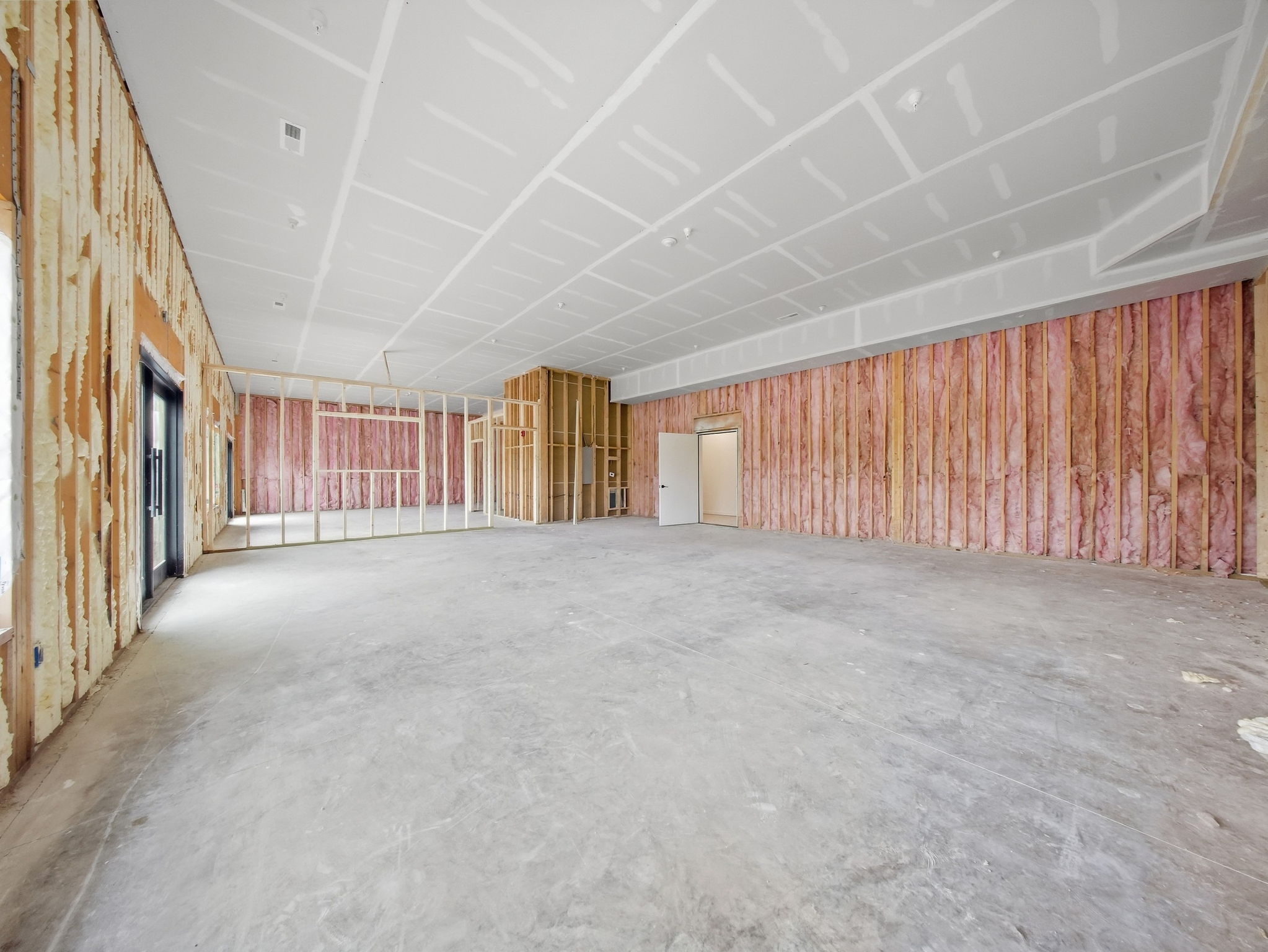 10 - Unfinished Interior - Insulated Wall and Open Floor