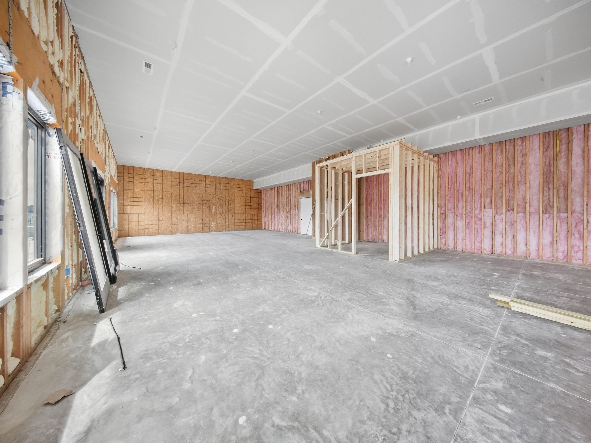 20 - Unfinished Interior - Framed Room Corner View