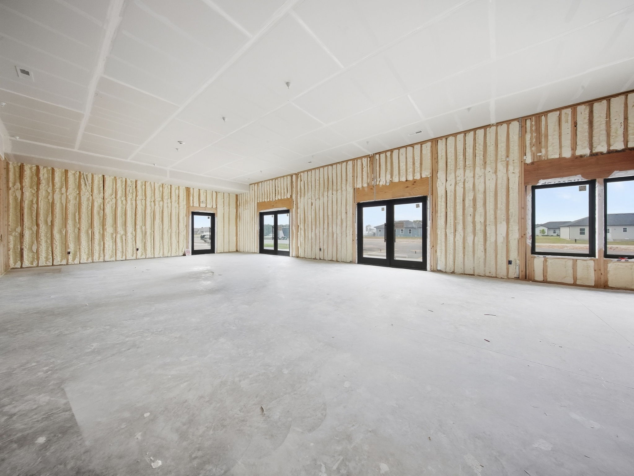 21 - Unfinished Interior - Storefront Door View