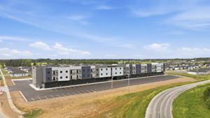 01 - Property Aerial - Front Exterior and Parking Lot
