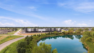 02 - Property Aerial - Building and Pond View