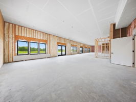 15 - Unfinished Interior - Storefront Window Wall