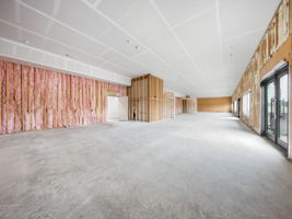17 - Unfinished Interior - Glass Entry View