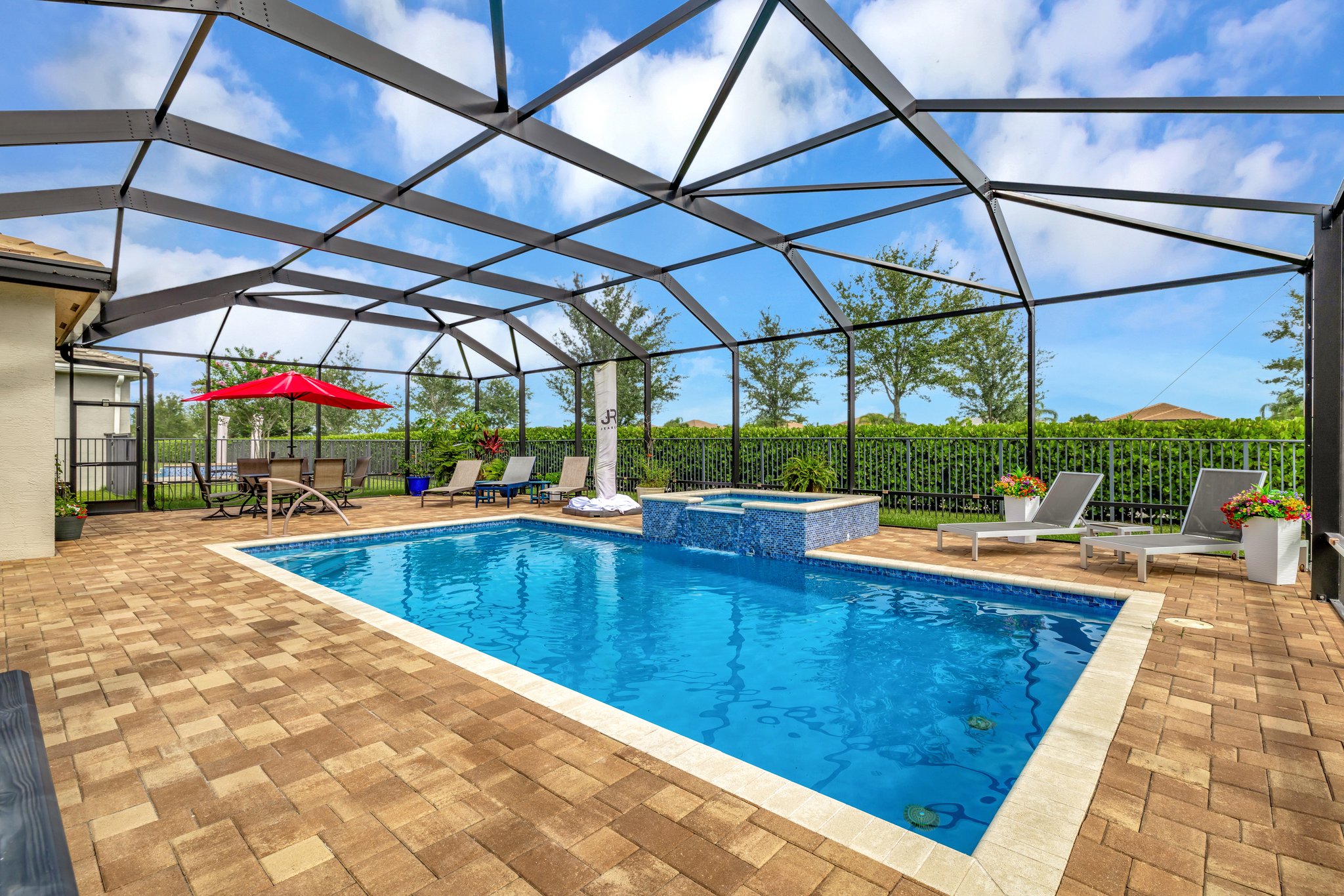 CUSTOM POOL WITH SPA HEATED & COOLED